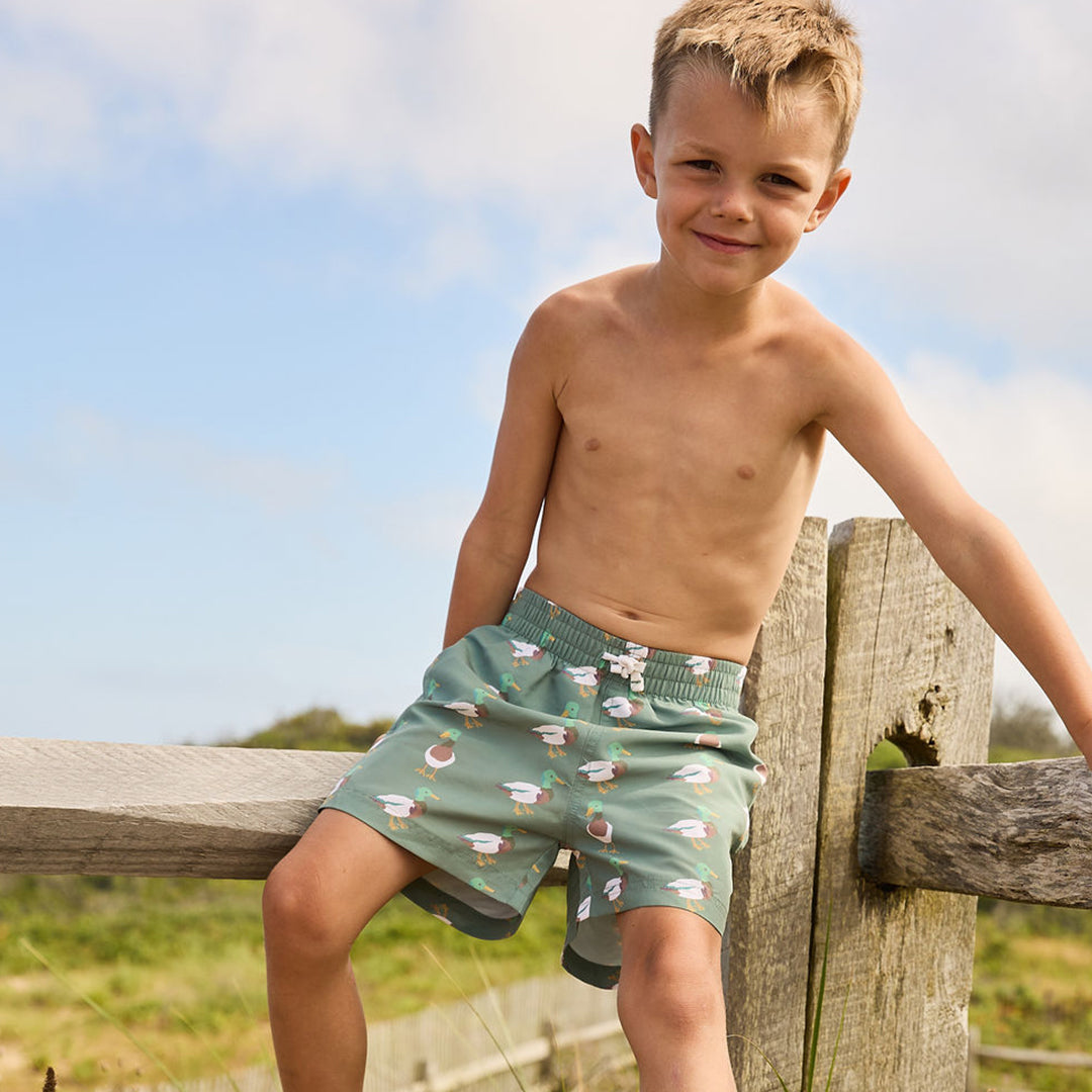 Boys green swim trunks online