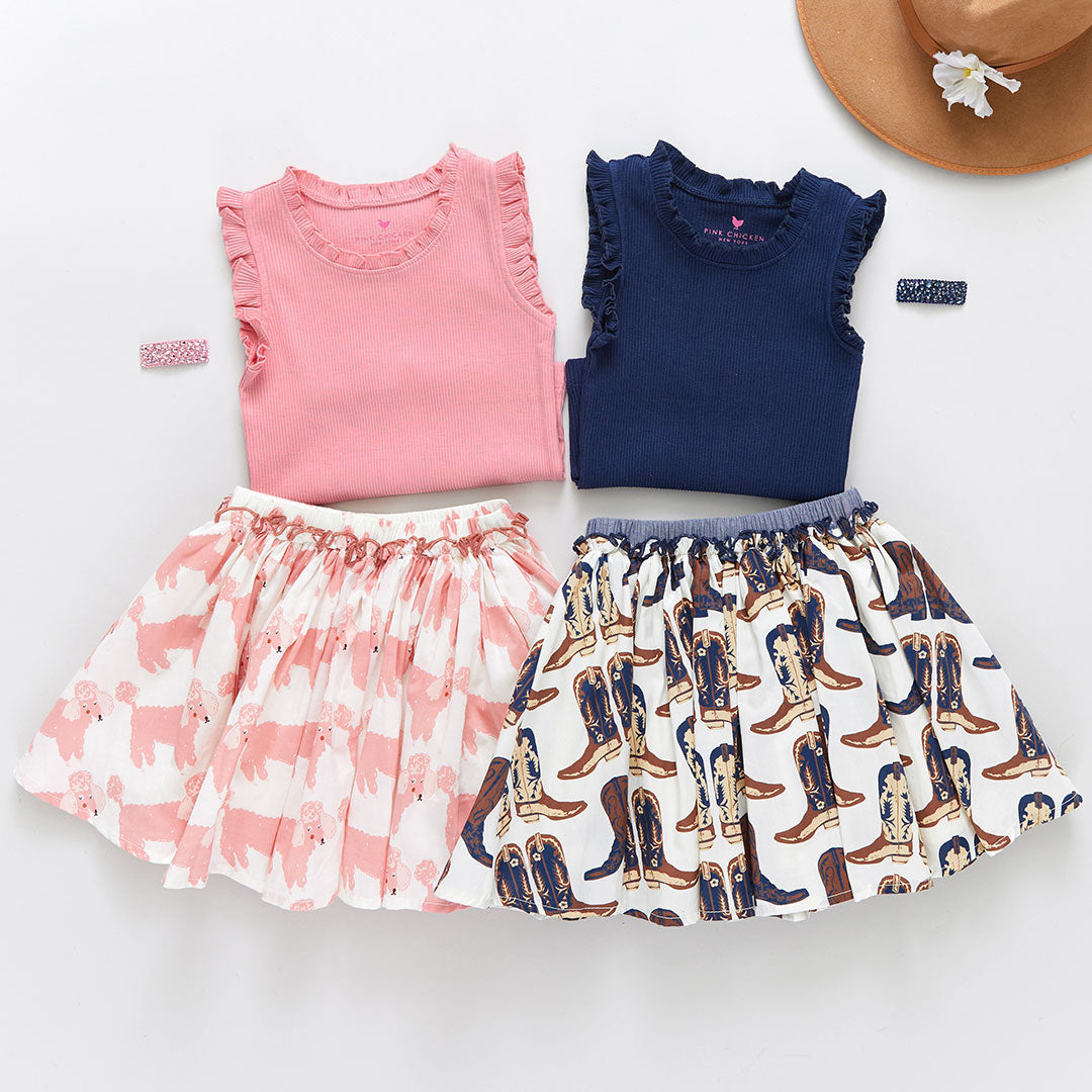 http://www.pinkchicken.com/cdn/shop/products/skirtsandruffletanksflatlay_8af02d41-05b9-4dbe-a16e-e655bacba501_1200x1200.jpg?v=1675357161